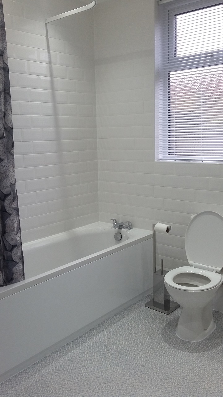 Bath, tiling and flooring installed
